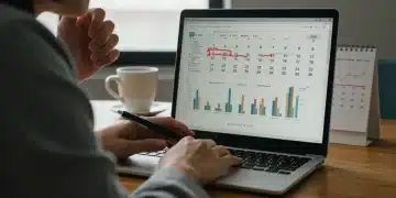 Thoughtful person analyzing student loan repayment strategies for 2026 on a laptop